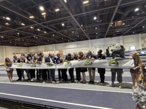 State and local dignitaries celebrate the opening of the Reno-Tahoe Indoor Track Facility at the Reno-Sparks Convention Center on Thursday night in Nevada. Photo by Matt Traub/SportsTravel