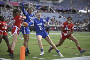 Team AFC and Team NFC play during the NFL High School Girls Flag Football Showcase on February 2, 2025 in Orlando, Fla. The NFL is leaning heavily into promoting girls and women's flag football, including the idea of a pro league. (Phelan M. Ebenhack/AP Content Services for the NFL)