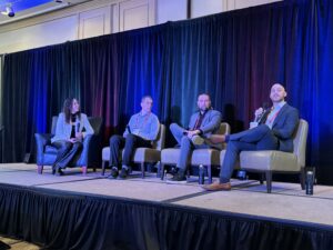 Mark Topley, right, New York Yankees associate director, strategic ticket sales and tourism, talks during a panel discussion on Wednesday at the International Inbound Travel Association summit in Salt Lake City. Also on the panel from left is Luisa Mendoza, Global Tourism Sports and Entertainment founder and chief executive officer; Jeff Gayduk, Premier Travel Media president and Brandon Furyk, Onward Travel Group vice president. Photo by Matt Traub/SportsTravel