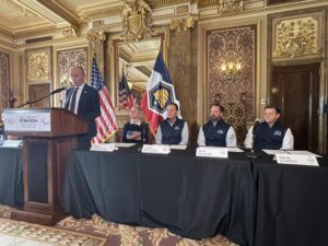Utah Governor Spencer Cox announces the formation of the local organizing committee for the 2034 Olympic and Paralympic Winter Games along with USOPC CEO Sarah Hirshland, Executive Chair and President Fraser Bullock, CEO Brad Wilson and Vice Chair Steve Starks. Photo by Matt Traub/SportsTravel