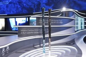 The torches for the Olympic and Paralympic Winter Games Milano Cortina 2026 are unveiled during the official unveiling ceremony at Italian Pavilion of Osaka Expo 2025 in Osaka. (AP Photo/Hiro Komae)
